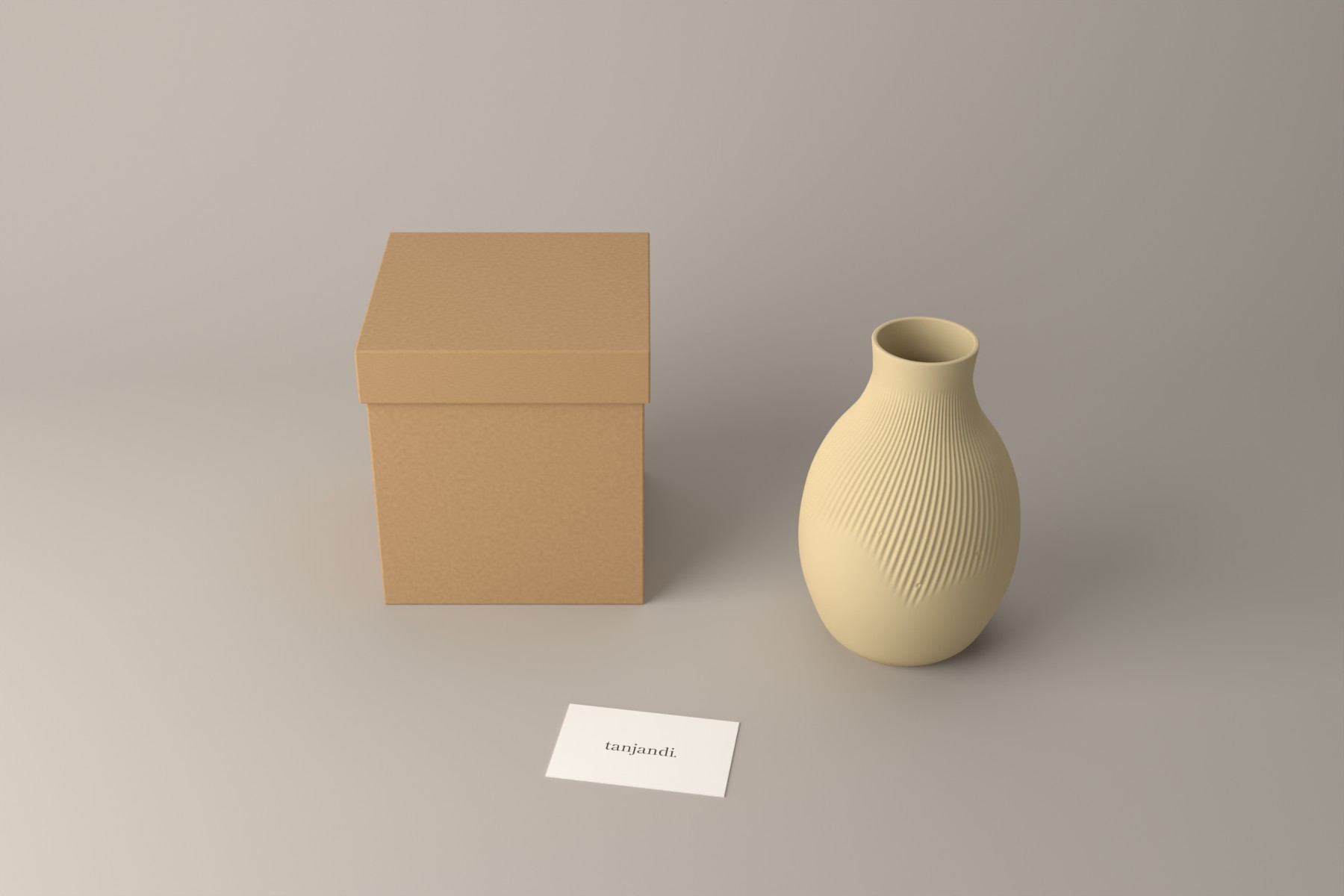 Vase Ame in Suna neben einer Kartonschachtel und einer Karte von tanjandi